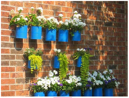 Latas recicladas para decorar el jardín